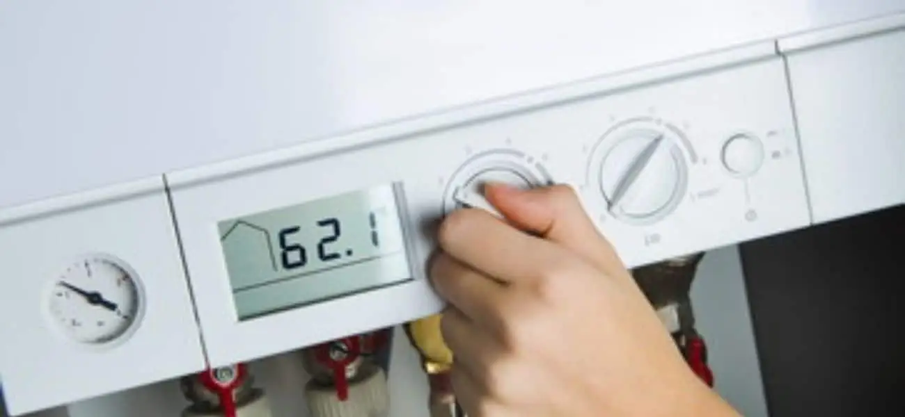 hand on boiler controls